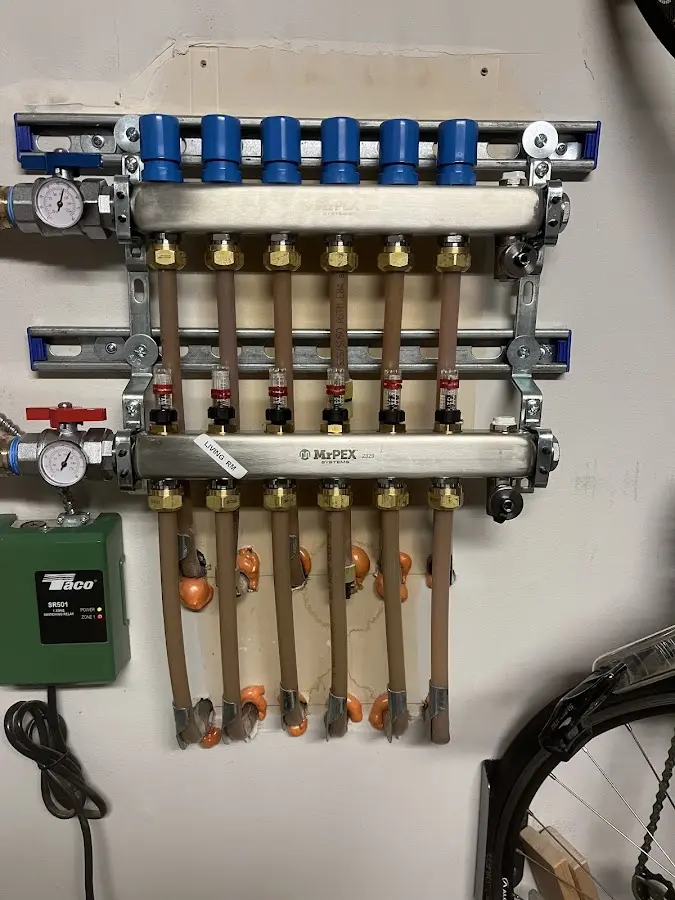 Plumber performing Water Heater Repair at a residential property in Eldorado at Santa Fe